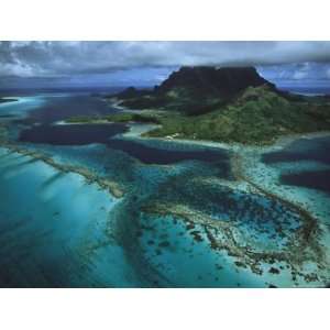 Reefs Ring a Pacific Island and Clouds Hide its Mountain Top National 