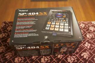 This is a like new in box Roland SP404 SX. Works perfectly