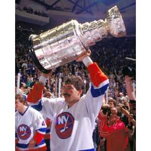  Clark Gillies holding up the cup 8x1