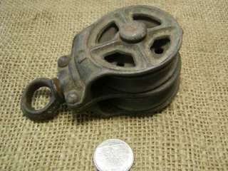   pulley with a very unique design and size. It has a swivel eyelet