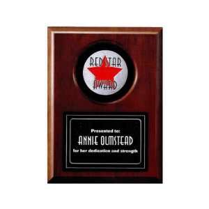   award plaque with an inset circular picture window and etched metal