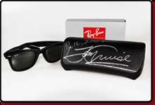 Tom Cruise donated his Ray Ban sunglasses (popularized in the film 