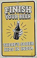 FINISH YOUR BEER   THERES SOBER KIDS IN INDIA SIGN  