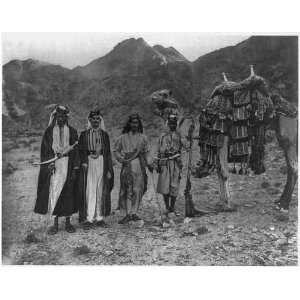  Four Arabs beside camel,Saudi Arabia,1889,decorated saddle 