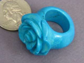   this ring is made from gemstone it is a cared rose carving ring from