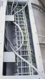   see the cable carrier that services the linear moving carriage inside