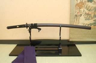 the older tachi style featuring more curvature japanese sword with a 