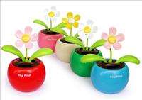 Solar Powered Flip Flap Dancing Baby Toy Flower New  