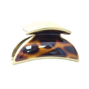   And Hand Painted Tortoise Shell Center Decorates This Euro Hair Claw