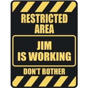   RESTRICTED AREA JIM IS WORKING  PARKING SIGN