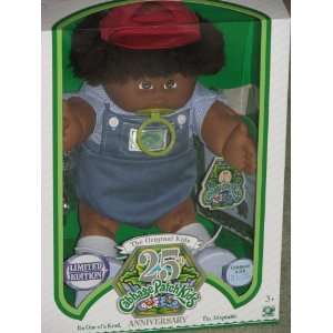   African American Boy Doll with Dark Brown Hair, Red Cap and Pacifier