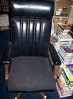   black leather,vinyl and fabric executive high back swivel chair used