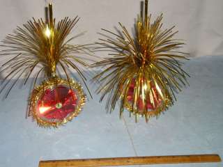TWO 8 1/4 gold paperboard expanding stars, have metal clips to 