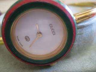 GUCCI Gold plated bangle watch 11/12 (regular) w/13 bezels incl gold w 