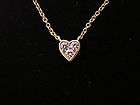 Heart Shaped 18K Yellow Gold Pendant with three 0.15ct 