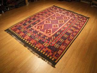 This is a Hand woven 6.7 x 9.7 Afghan Kilim Rug, Woven By Afghan 