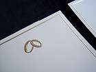 150 gartner gold double intertwined rings on ivory wedding invitations