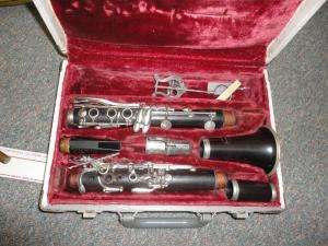 Lot also includes a bassoon? in a carrying case, and 6 clarinets, from 