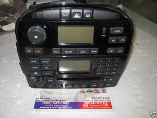2004   2006 04   06 JAGUAR XJ8 RADIO CD PLAYER WITH HEATER AC CONTROL 