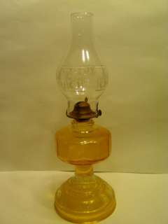   YELLOW GLASS KEROSENE LAMP OIL LAMP WITH CLEAR GLASS GLOBE  