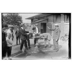  4 men near drinking fountain in park