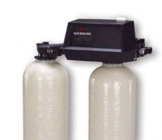 Twin tank metered water softener with 1 Fleck 9100SXT control, 64,000 