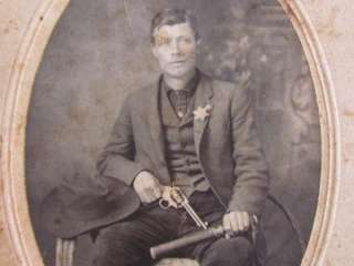 1890s lawman holding a pistol & night stick photograph  