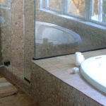 Tan Pebble Tile Shower