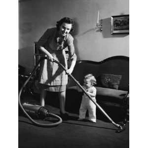  Mother and Baby Boy Holding Vacuum Cleaner Photographic 